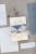 zaproszenia-dusty-blue-dodatki-slubne-niebieskie-menu-winietka-numer-stolu_rwany-papierboho-zaproszenia (2).jpg