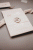 rose-gold-zaproszenie-na-chrzest-komunie-rozowe-zloto-pudroworozowy-papier-opaska-z-kalki-wstazka-szyfonowa-glamour-eleganckie-minimalistyczne-zlocone (4).gif