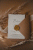 zaproszenie-tloczone-boho-kremowe-styl-rustykalny-tloczony-krzyz-zaproszenie-na-chrzest-komunie-motyw-religijny-wstazka-szyfonowa-wycinana-koperta (7).gif